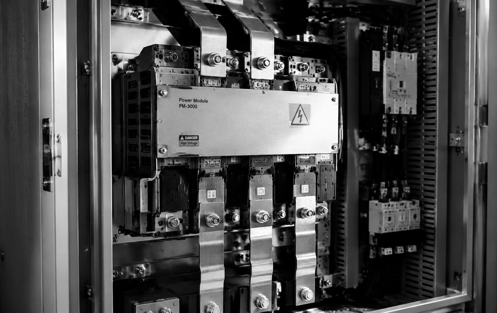 Power modules and copper busbars inside an industrial drive cabinet